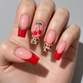A close-up of a hand displaying a set of long square-shaped nails with a pink-to-red French manicure, leopard print tips, a cherry design, and rhinestone detailing.