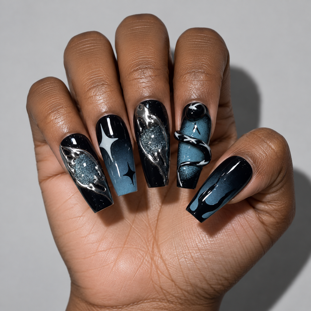 A close-up of a hand showcasing a detailed space-themed nail art design. The nails feature a glossy black and deep blue gradient background with silver metallic swirls, star patterns, and glittery galaxy details.